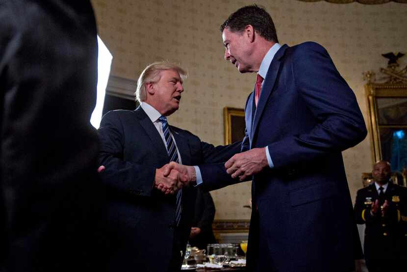 U.S. President Donald Trump meet with James Comey during an Inaugural Law Enforcement...
