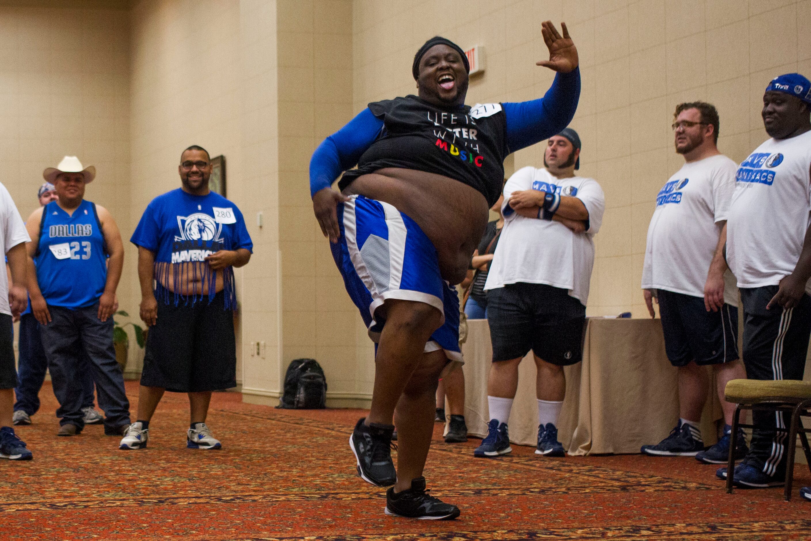 Major Attaway, of Fort Worth, performs for judges during The Mavs ManiAACs tryouts, which...