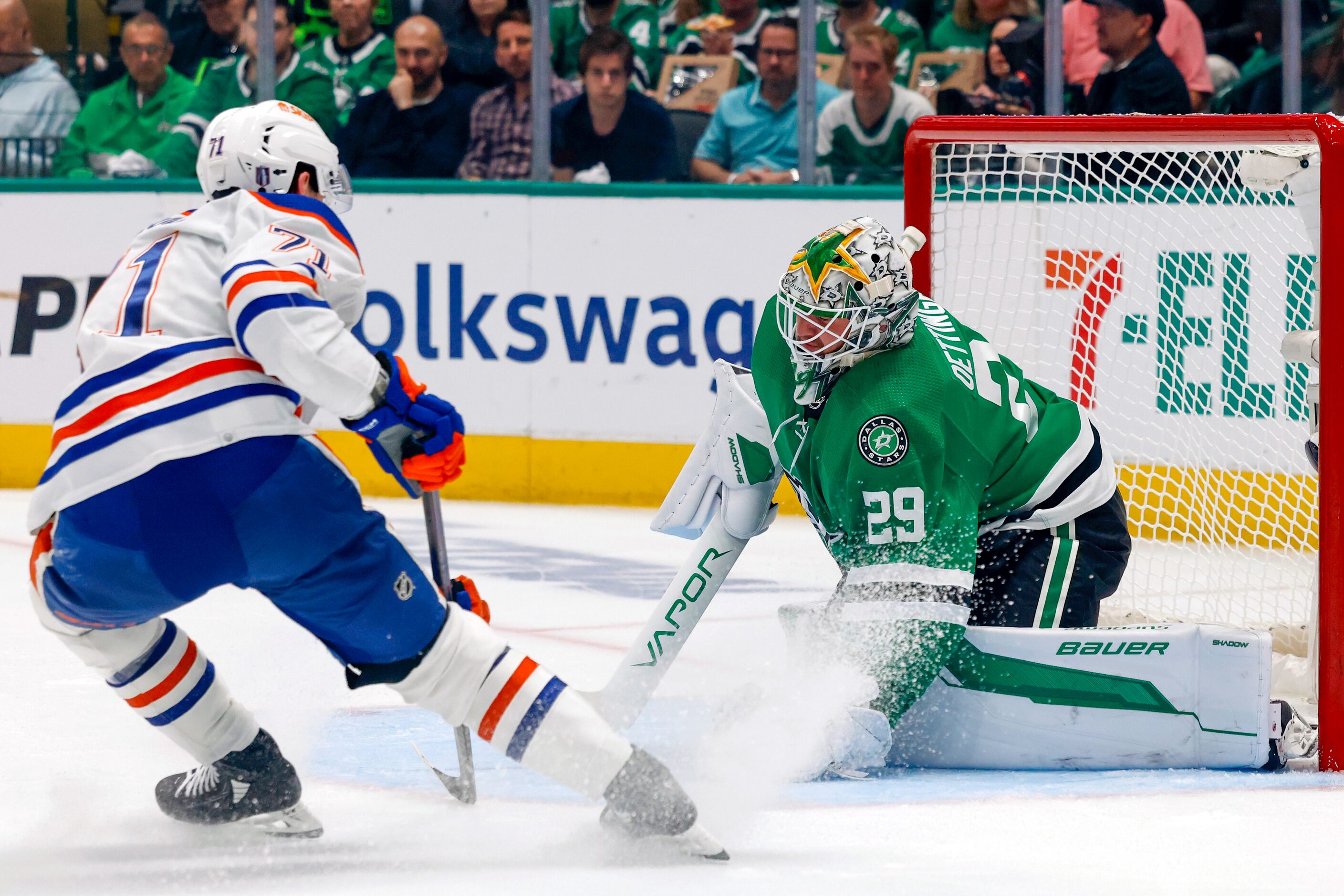 Edmonton Oilers center Ryan McLeod (71) slides to a stop as Dallas Stars goaltender Jake...