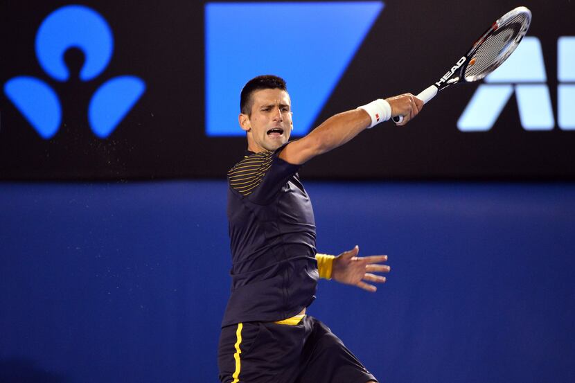 Jan 20, 2013; Melbourne, AUSTRALIA; Novak Djokovic (SRB) returns a shot against Stanislas...