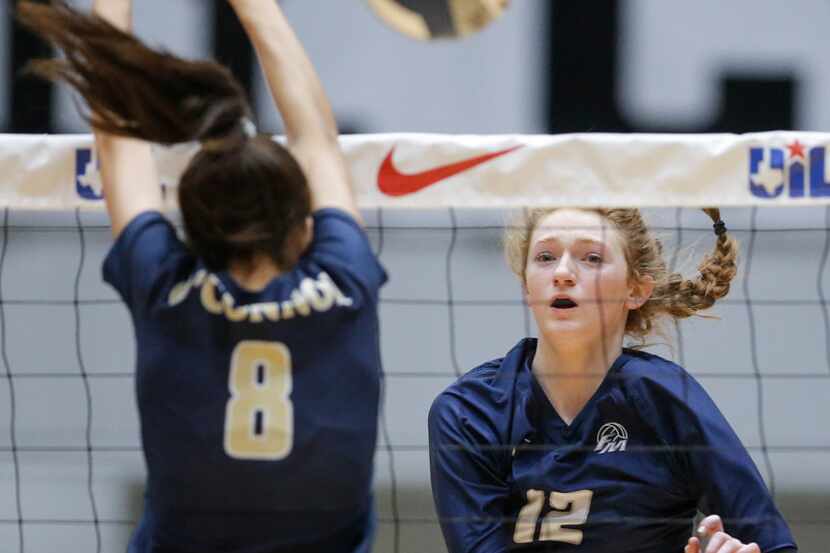 Flower Mound's Angelique Cyr (12) spikes the ball against Northside O'Connor in last year's...
