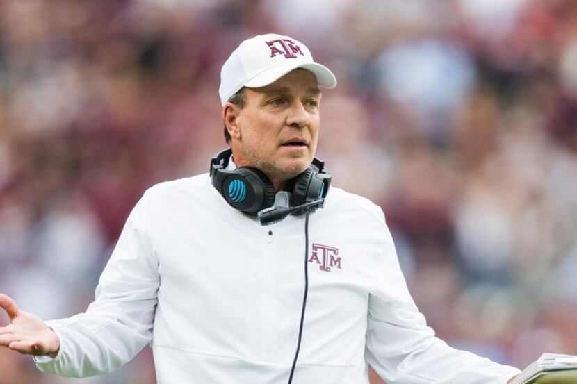 Texas A&M Aggies head coach Jimbo Fisher disputes a call during the first quarter of a...