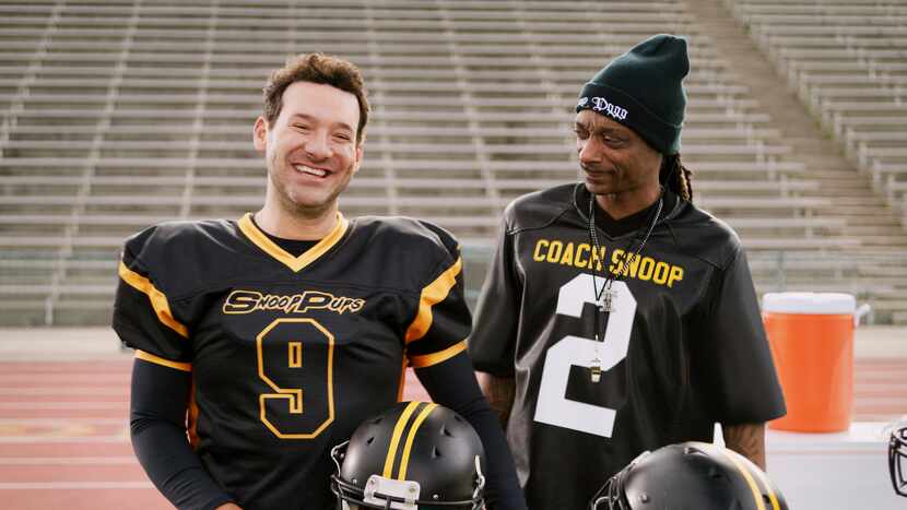 Tony Romo and Snoop Dogg share a scene in Skechers 2023 Super Bowl NFL football spot. 