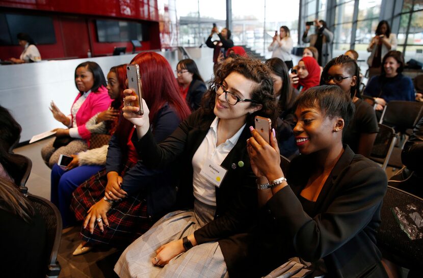 Brianna Saldaña ,17 (center)  and Kaiya McKinney, 17 of 
Young Women's Leadership Academy in...