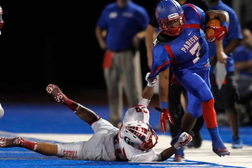 
Parish Episcopal running back Dominic Williams (7) is forced out of bounds by Glen Rose...