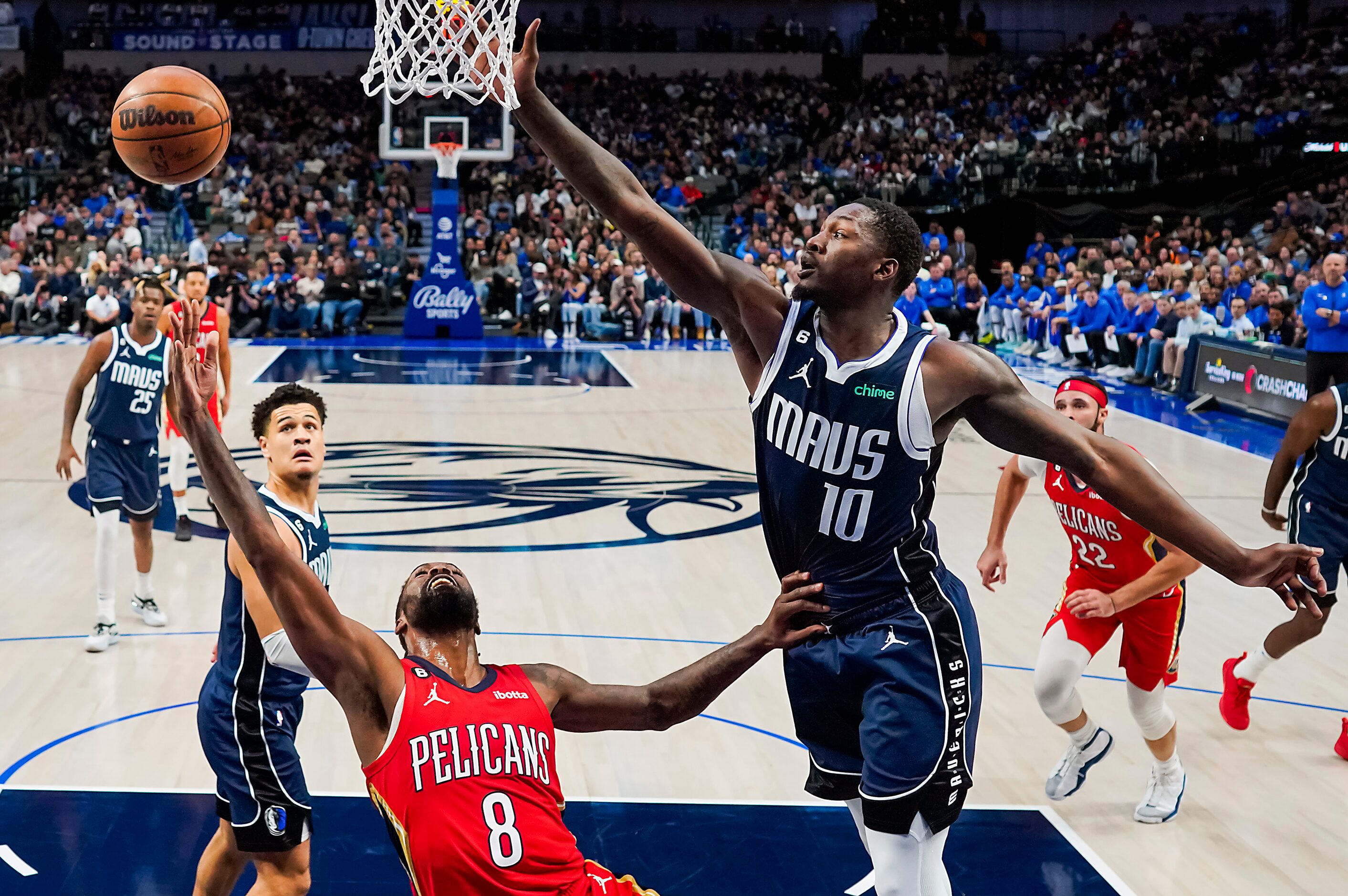 New Orleans Pelicans forward Naji Marshall (8) puts up a shot as Dallas Mavericks forward...