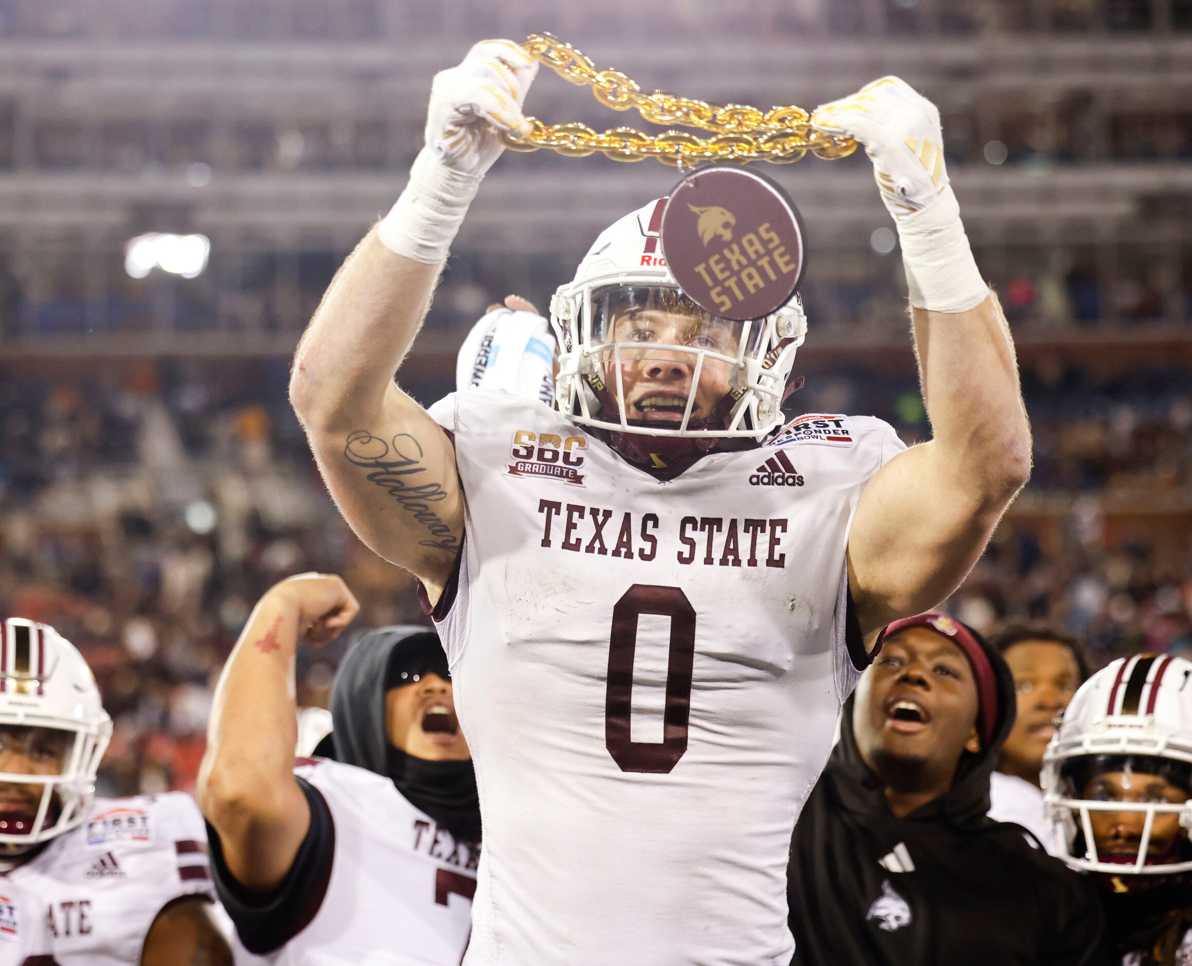 Texas State linebacker Brian Holloway (0) celebrates his second pick six against the Rice...