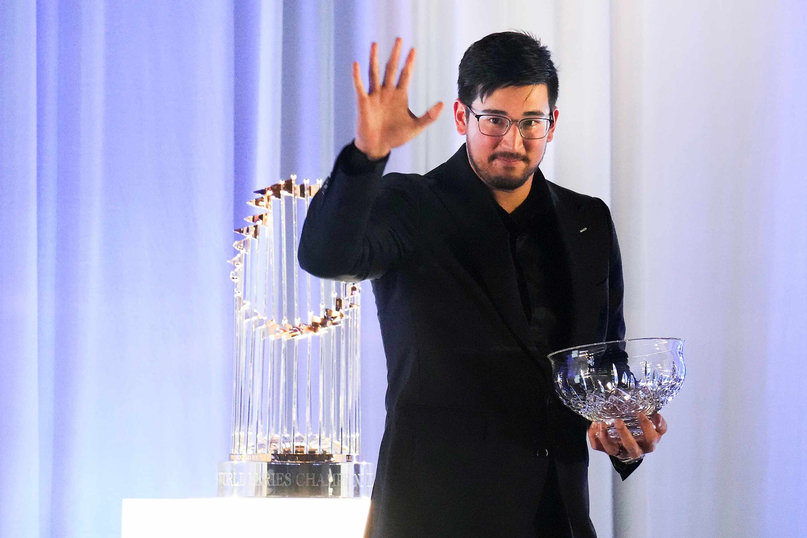 Dane Dunning  is presented with the 2023 Texas Rangers Pitcher of the Year award during the...