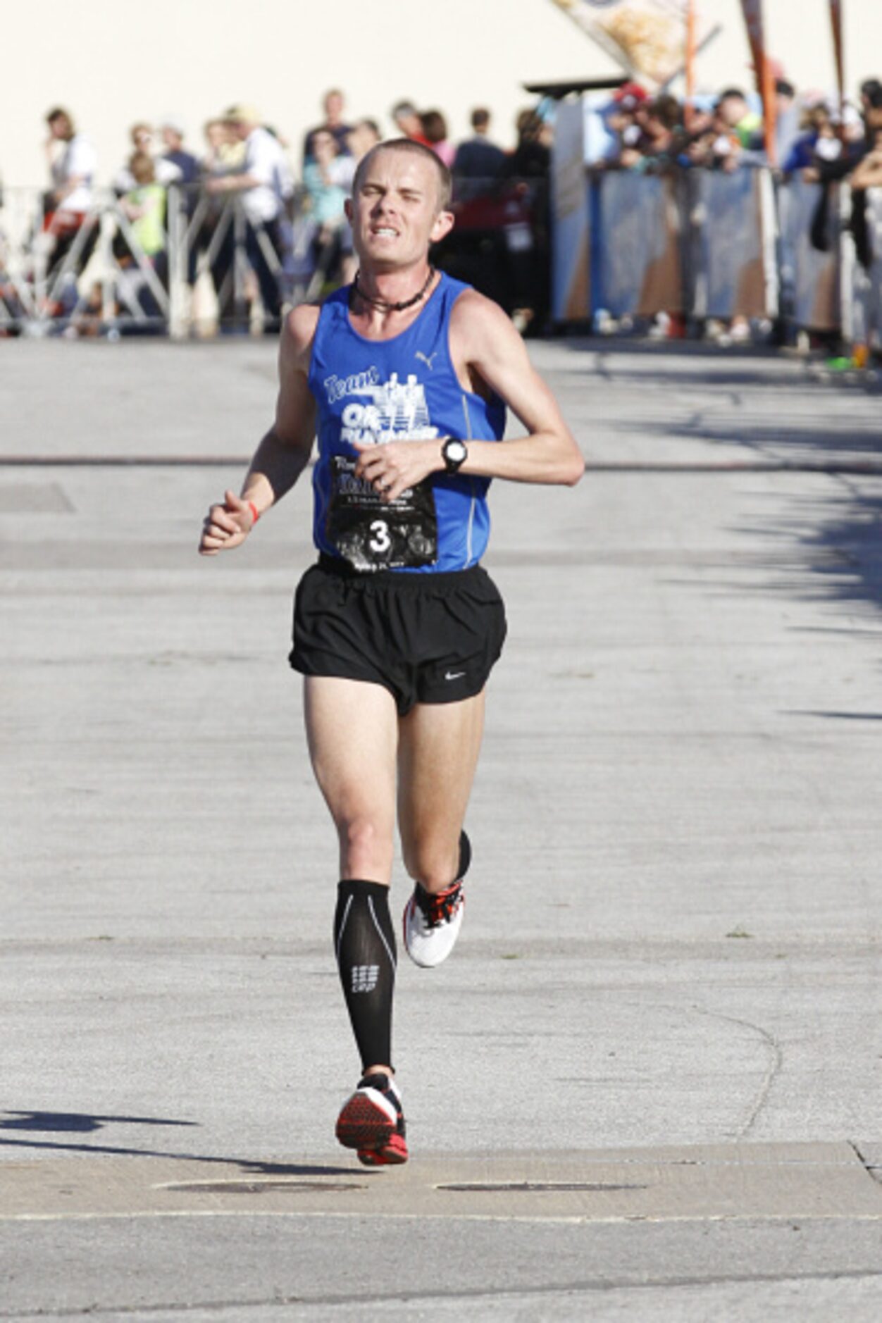 Jerry Faulkner runs in the Dallas Rock 'N' Roll half marathon on Sunday, March 25, 2012.