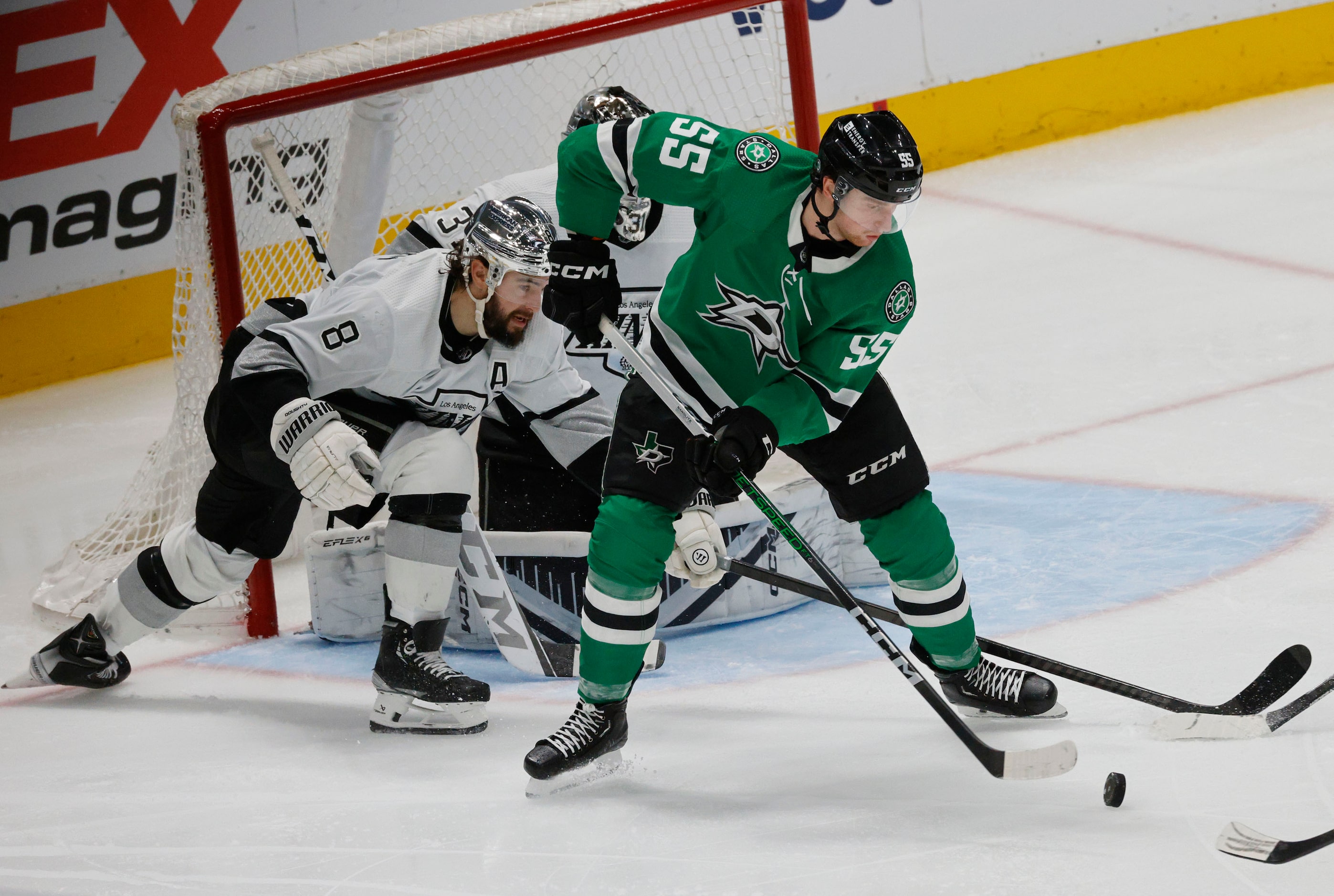 Dallas Stars defenseman Thomas Harley (55) controls the puck against Los Angeles Kings...