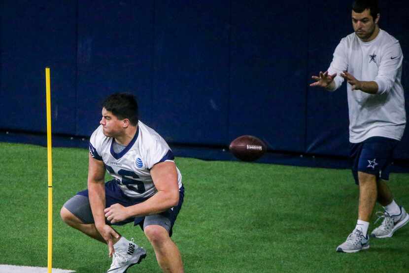 Dallas Cowboys offensive lineman Connor McGovern (66) runs through drills during the Cowboys...