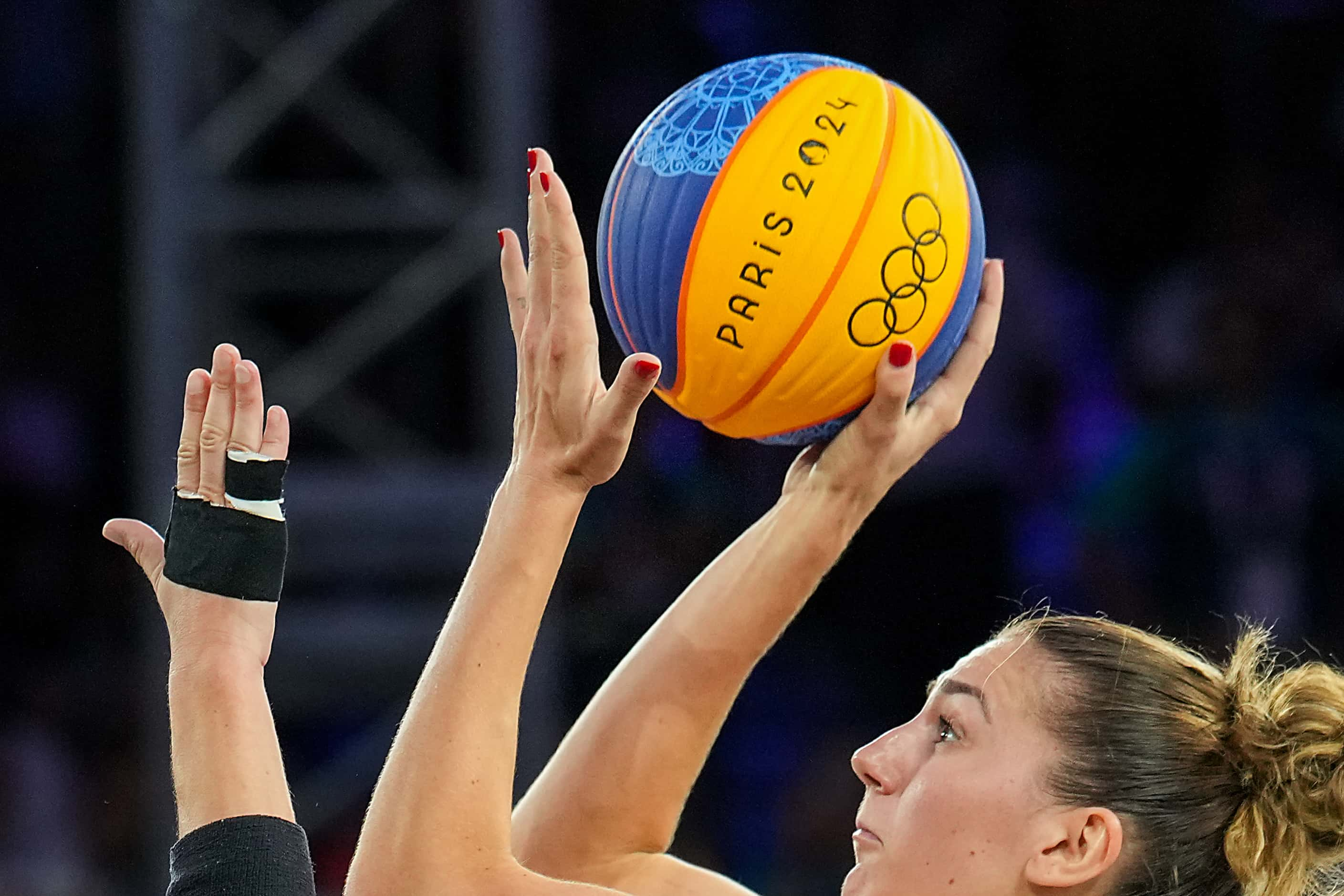 Germany’s Marie Reichert (6) shoots over Spain’s Gracia Alonso (44)  during the women’s 3x3...