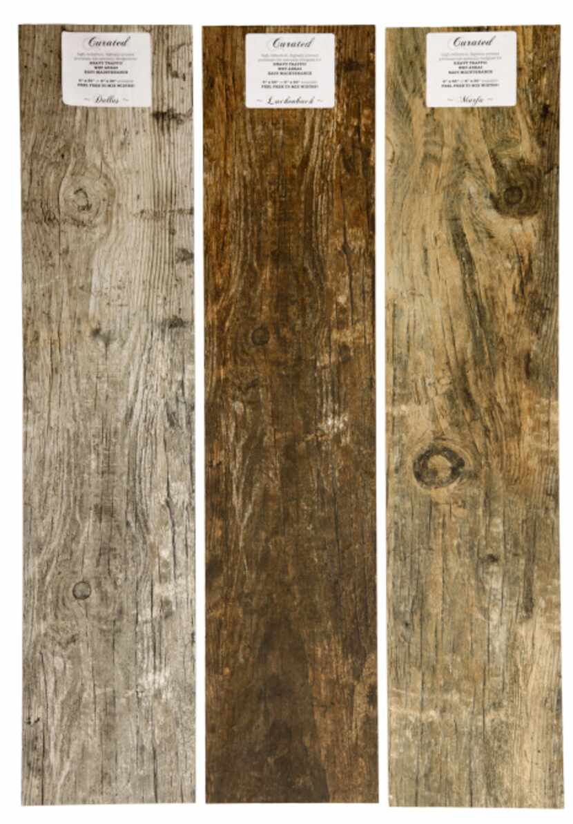These faux-wood floor tiles are named  Dallas, Marfa and Luckenbach and cost $5.40 per...