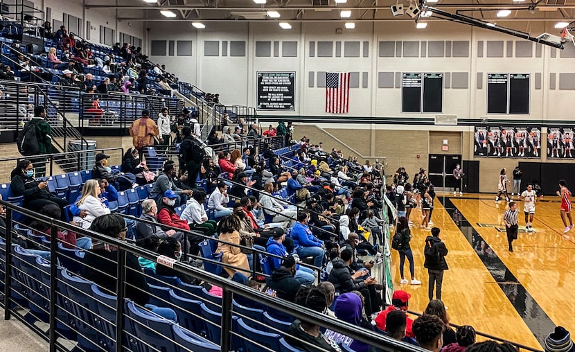 The crowd at Mansfield Lake Ridge High School's gymnasium for a basketball game on Jan. 7,...