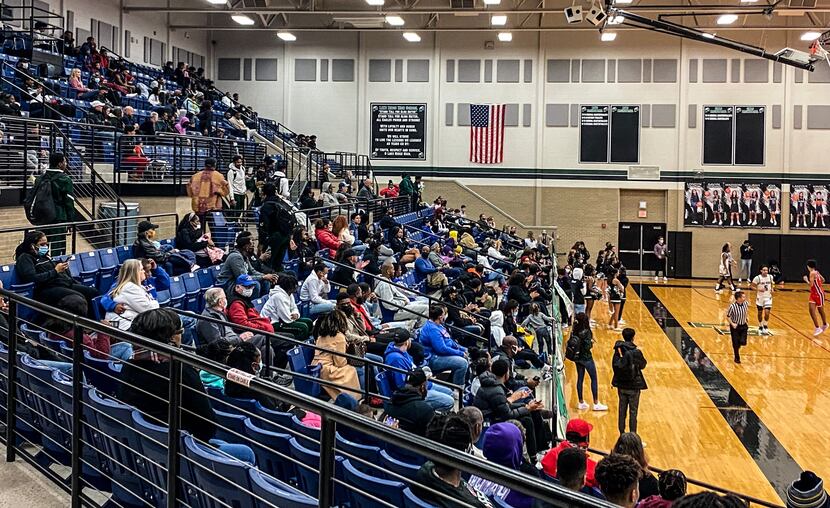 The crowd at Mansfield Lake Ridge High School's gymnasium for a basketball game on Jan. 7,...