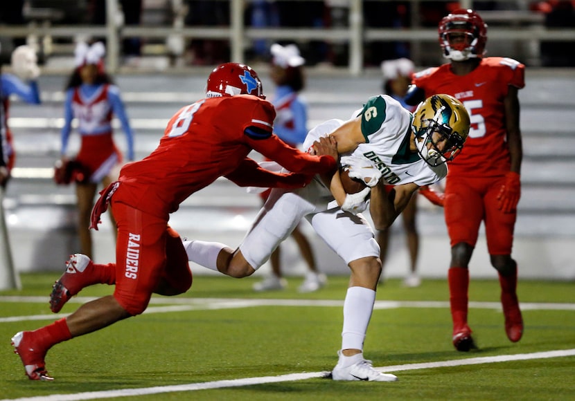 DeSoto wide receiver Lawrence Arnold Jr (6) leans across the goal line for a second quarter...