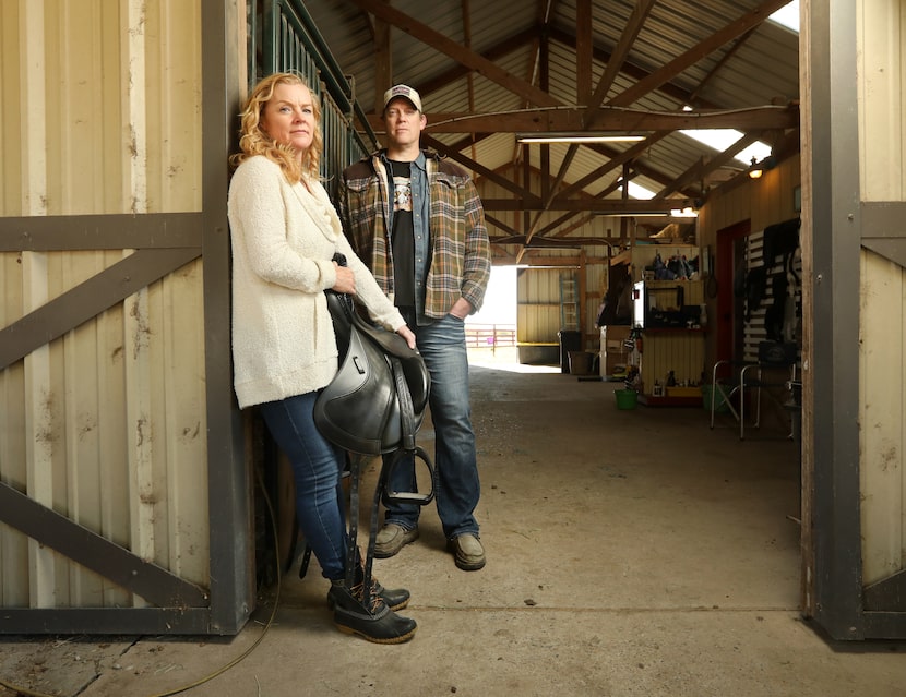 Amber Block, left, and Dan Block pose for a photograph at their home in McKinney, TX, on Nov...