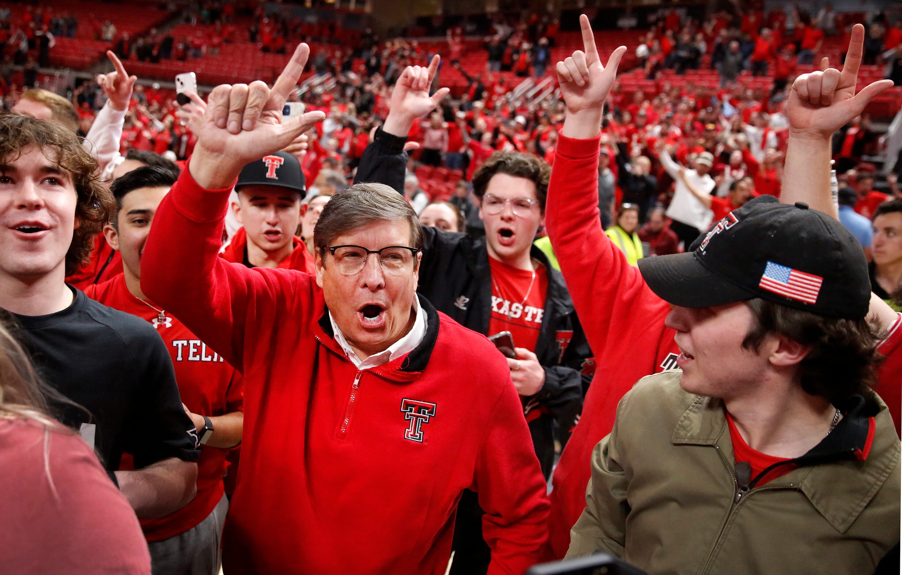 Texas Tech Red Raiders head coach Mark Adams joined the student body in a post game...