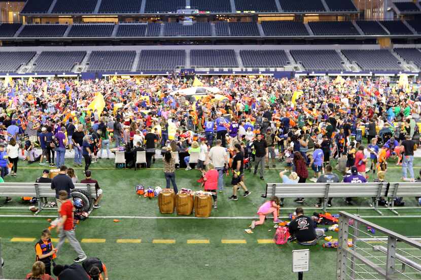 Thousands of Nerf fans battle on the field during the Jared's Epic Nerf Battle 3 event at...