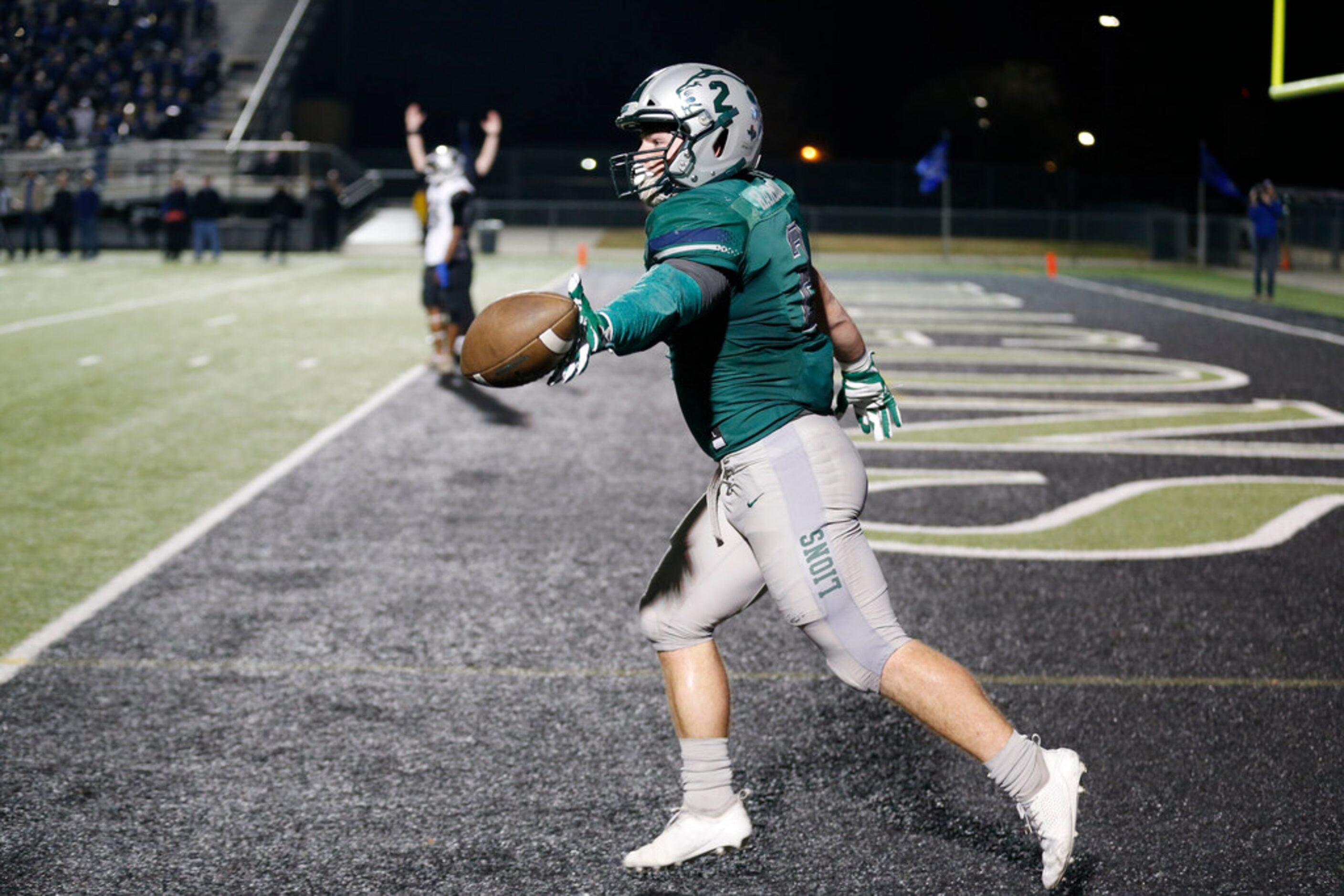 Frisco Reedy's Will Harbour  celebrates his rushing touchdown against Burleson Centennial...