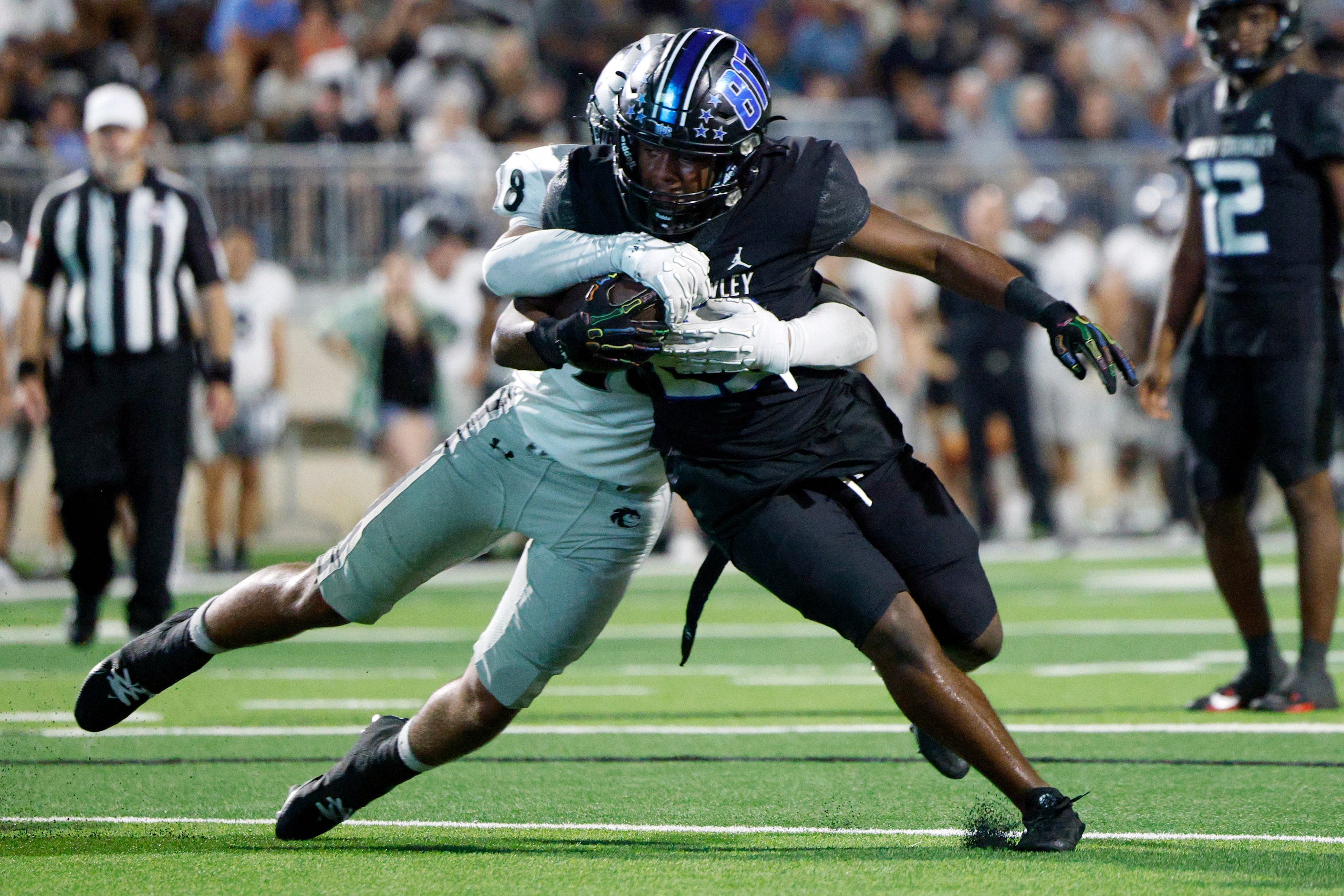 Denton Guyer defensive back Jaylon Sterling (18) forces a fumble from North Crowley running...