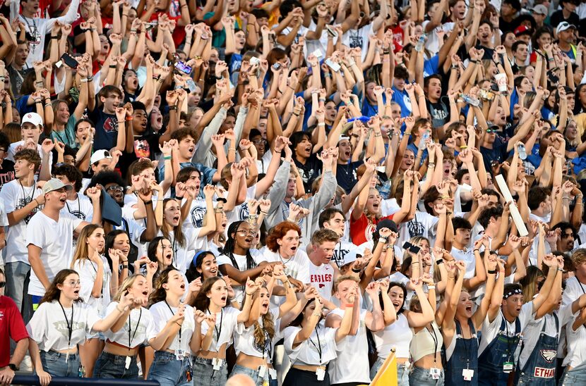 The Allen student section cheered in the first half of a high school football game in Allen...