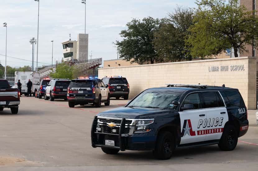 Arlington Police Officers outside of Lamar High School after a school shooting left two...