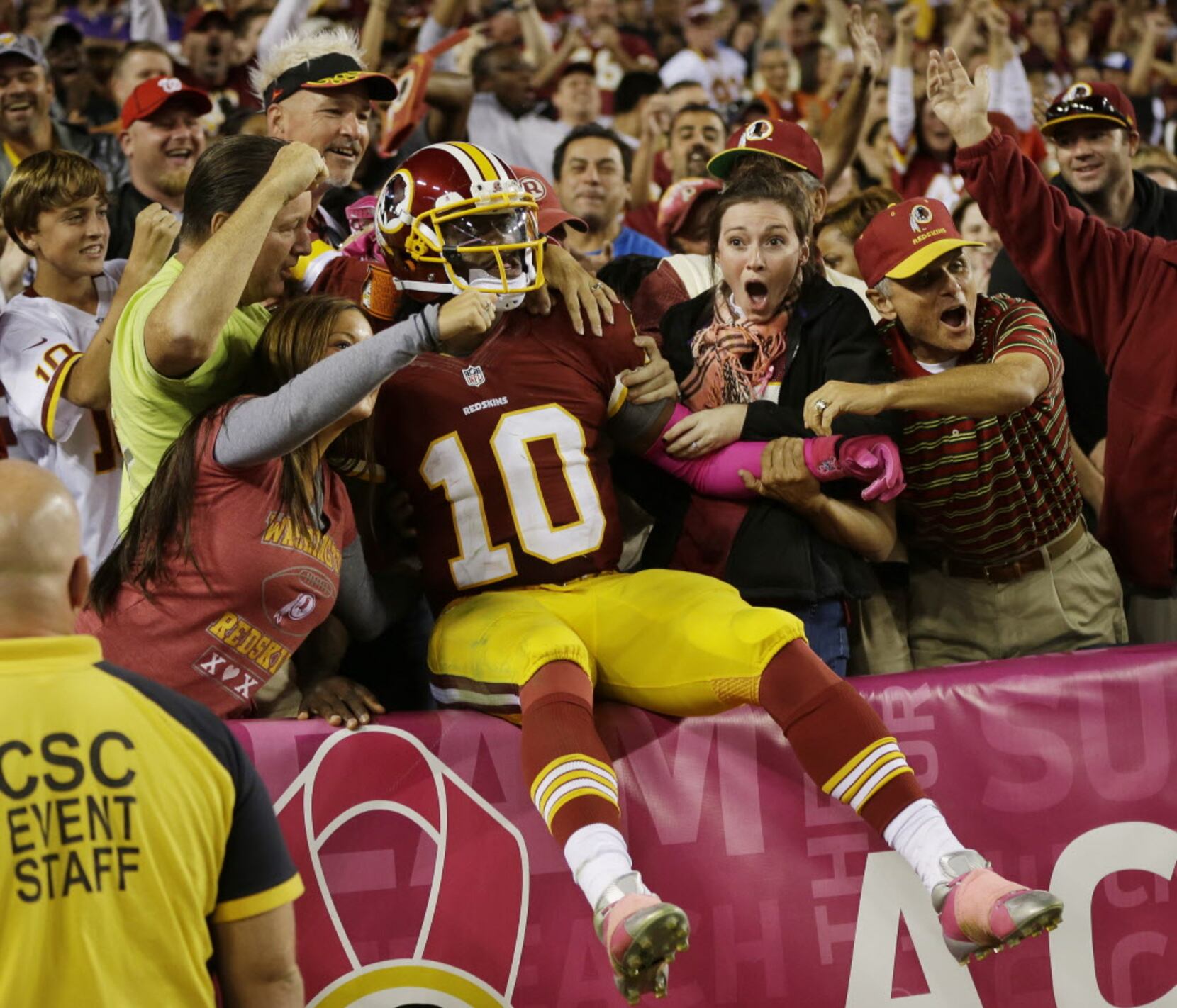 Texas man pays $15,000 for Robert Griffin's pink cleats