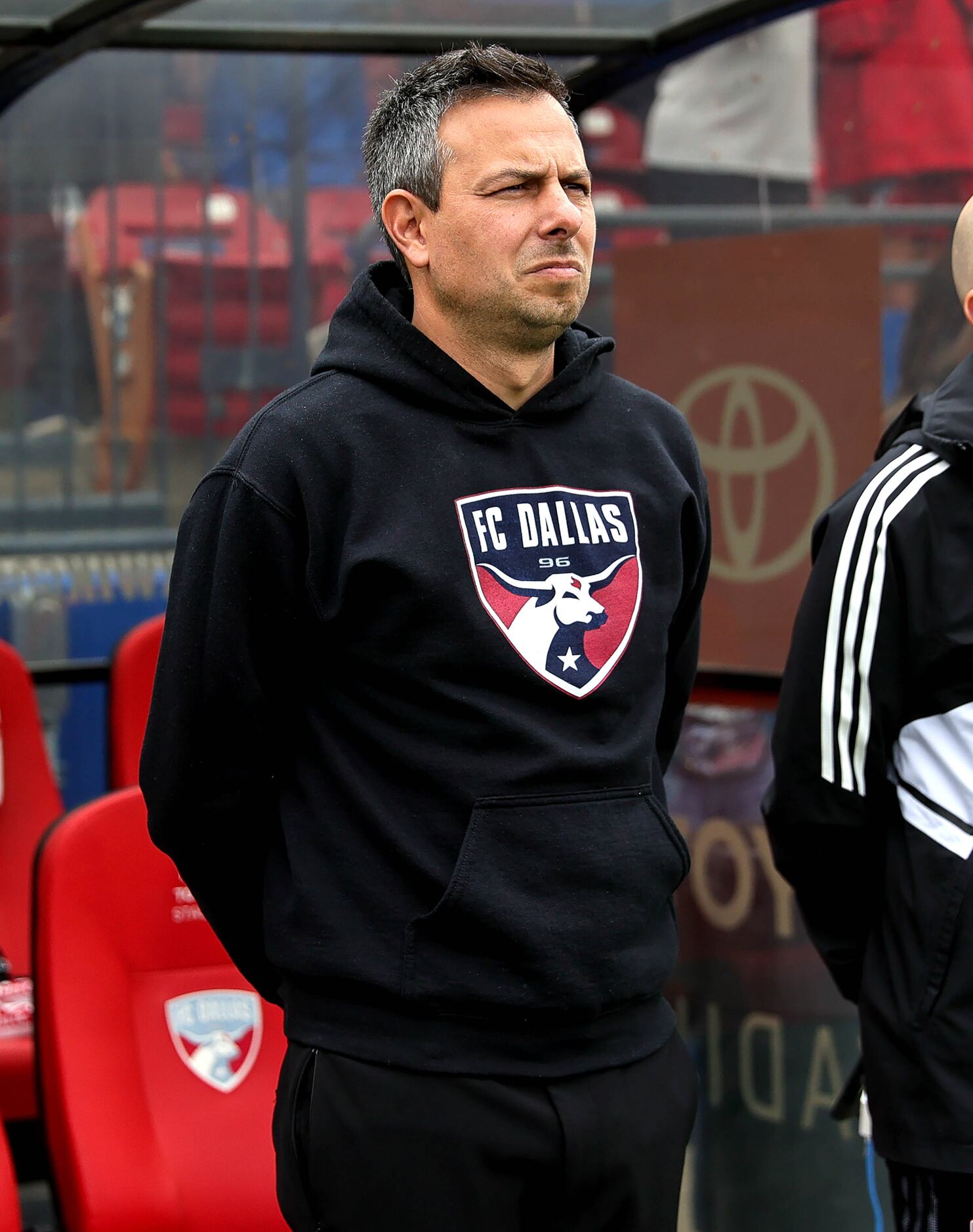 FC Dallas head coach Nico Estevez stands on the sideline before the game against Minnesota...