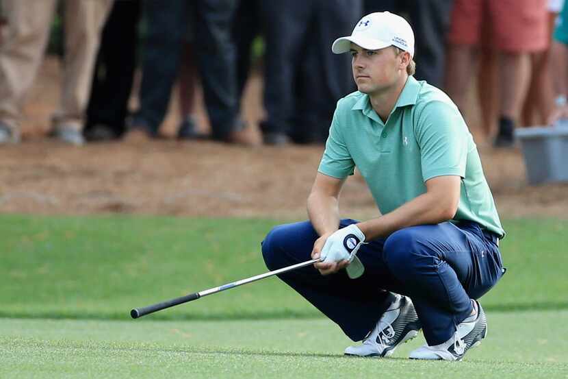 AUGUSTA, GA - APRIL 13:  Jordan Spieth of the United States reacts to a poor shot on the...