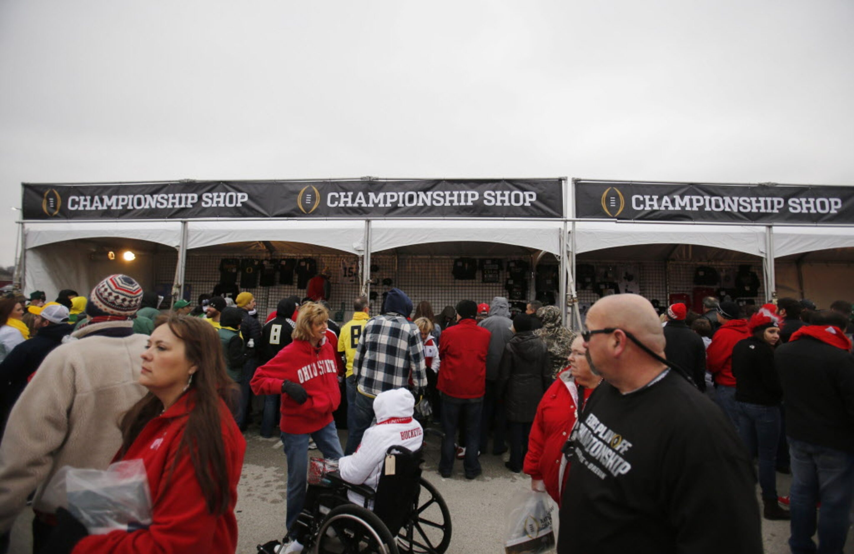 Fans make their way by the Championship shop before a game between Oregon and Ohio State...