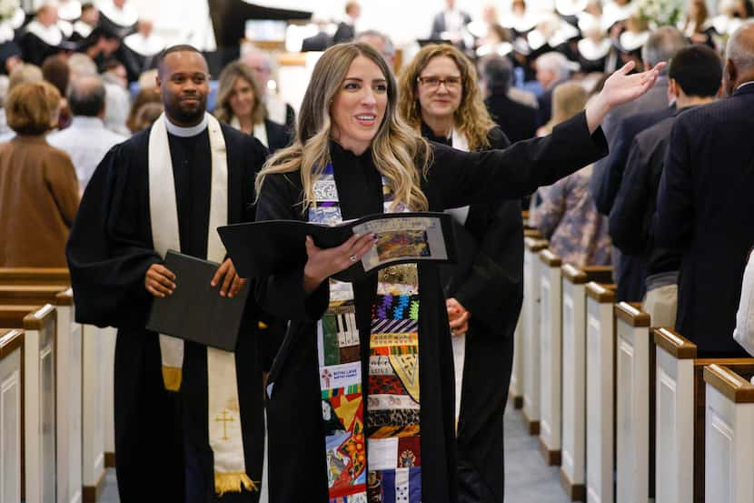 Rev. Victoria Robb Powers (center) is the first female and first Hispanic senior pastor of...