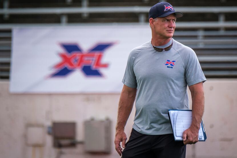 Dallas XFL personnel director Daryl Johnston watches tryouts for the new Dallas XFL pro...