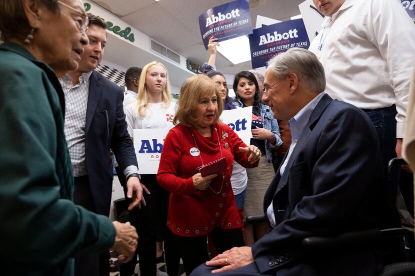 Texas Governor Greg Abbott speaks to supporters following a Get Out The Vote event at Ben...