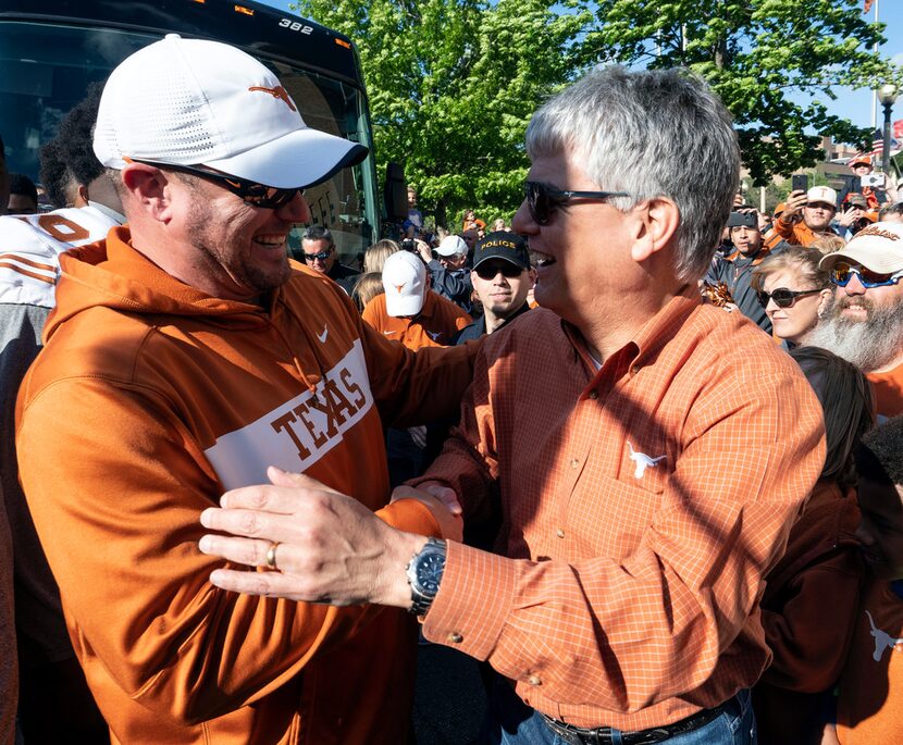 University of Texas head coach, Tom Herman, and University of Texas at Austin President,...