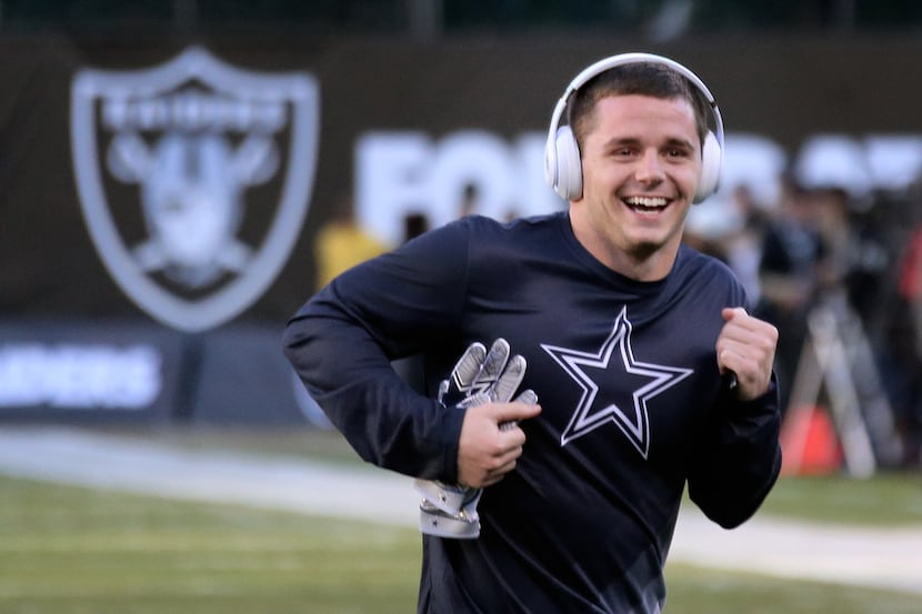 Dallas Cowboys wide receiver Ryan Switzer (10) laughs as he warms up with teamates before...