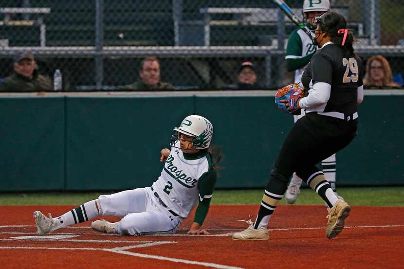 Prosper's Alyssa Gonzalez (2) scores a run on a wild pitch during Tuesday's 9-5 win over The...