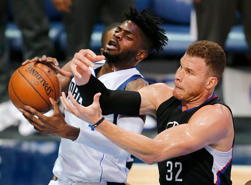 Dallas Mavericks forward Nerlens Noel (3) and LA Clippers forward Blake Griffin (32) battle...