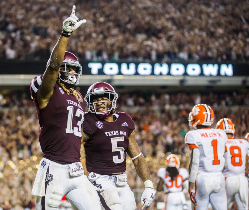 Texas A&M Aggies wide receiver Kendrick Rogers (13) and running back Trayveon Williams (5)...