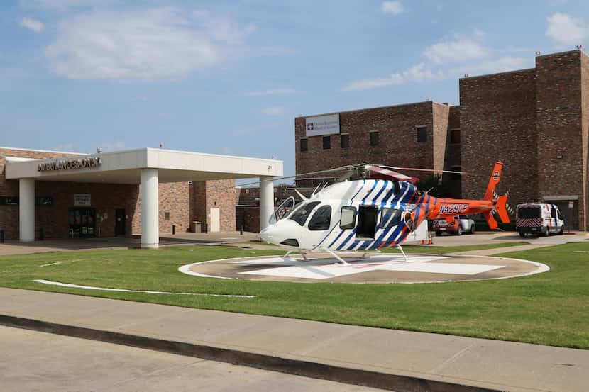 A helicopter rests on the landing pad at Dallas Regional Medical Center in Mesquite. The...