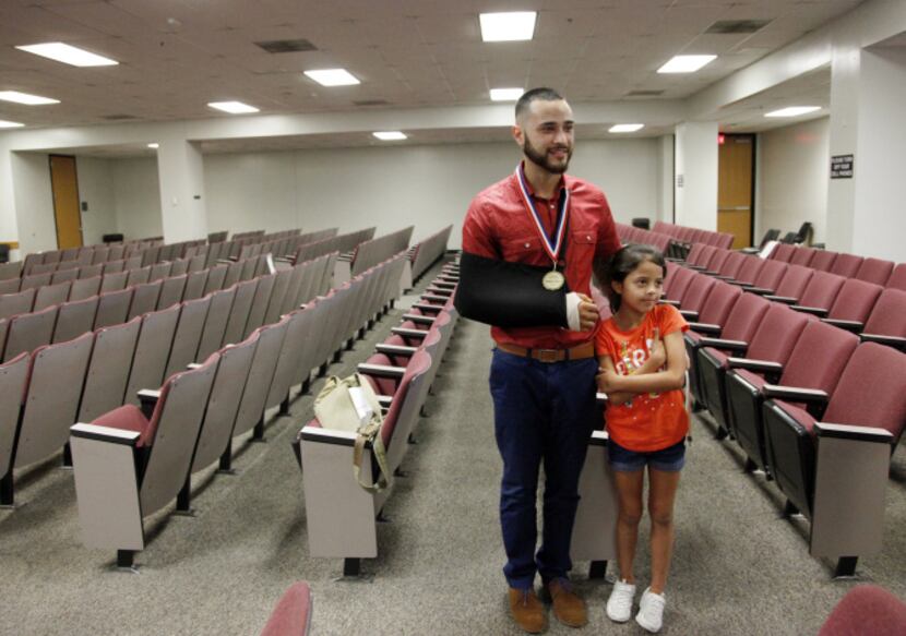 DIVERT graduate Stephan Chavez was joined by his sister, Gabriella Uresti, 7, after the July...