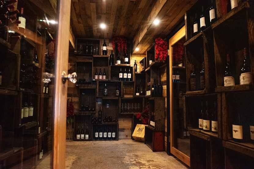 Walk through this wine cellar and you'll find the entrance of a speakeasy. The bar isn't...
