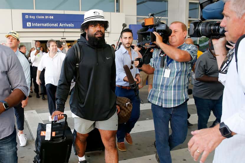 Dallas Cowboys running back Ezekiel Elliott arrives through customs at Dallas Fort Worth...