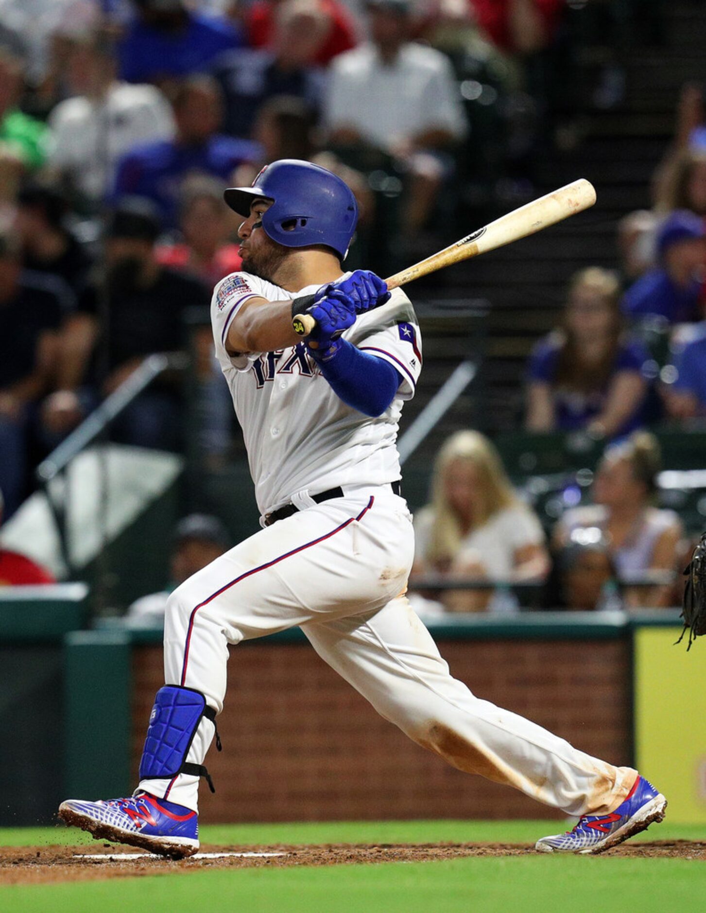 ARLINGTON, TEXAS - AUGUST 30: Jose Trevino #56 of the Texas Rangers hits a two run double...