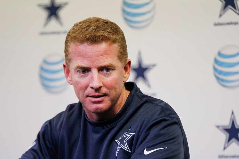 Dallas Cowboys coach Jason Garrett speaks to the media during the news conference at the...