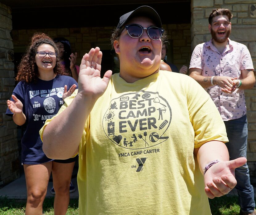 Staff member Jessica Simants learns a cheer during Camp Carter training. A recent by Big...