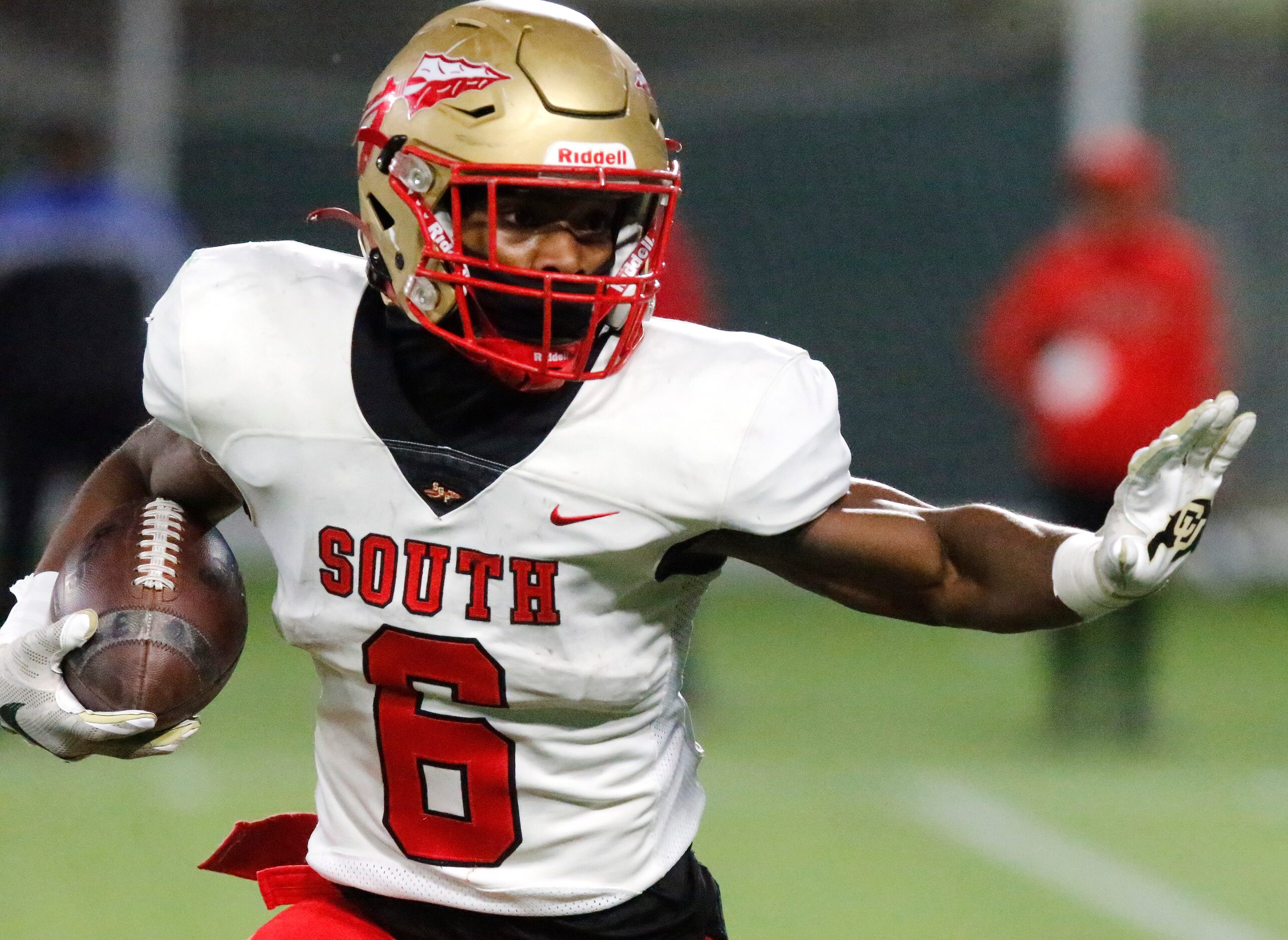 South Grand Prairie High School running back Ahmahn Newberry (6) looks for the goal line...