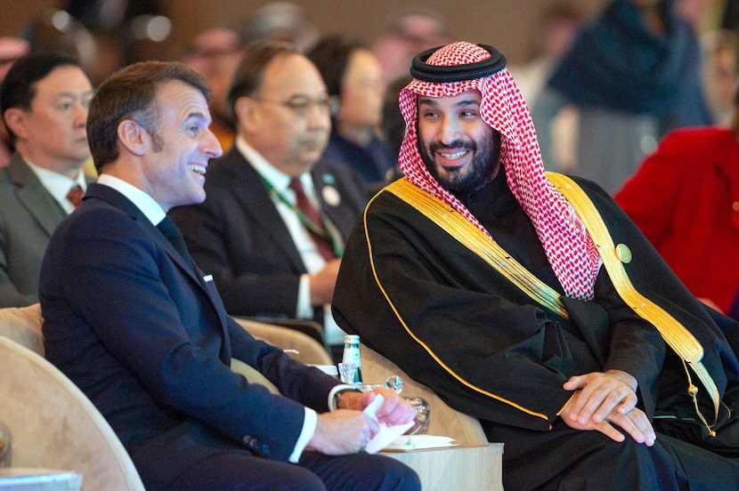 In this photo provided by the Saudi Royal Palace, Saudi's Crown Prince Mohammed bin Salman,...