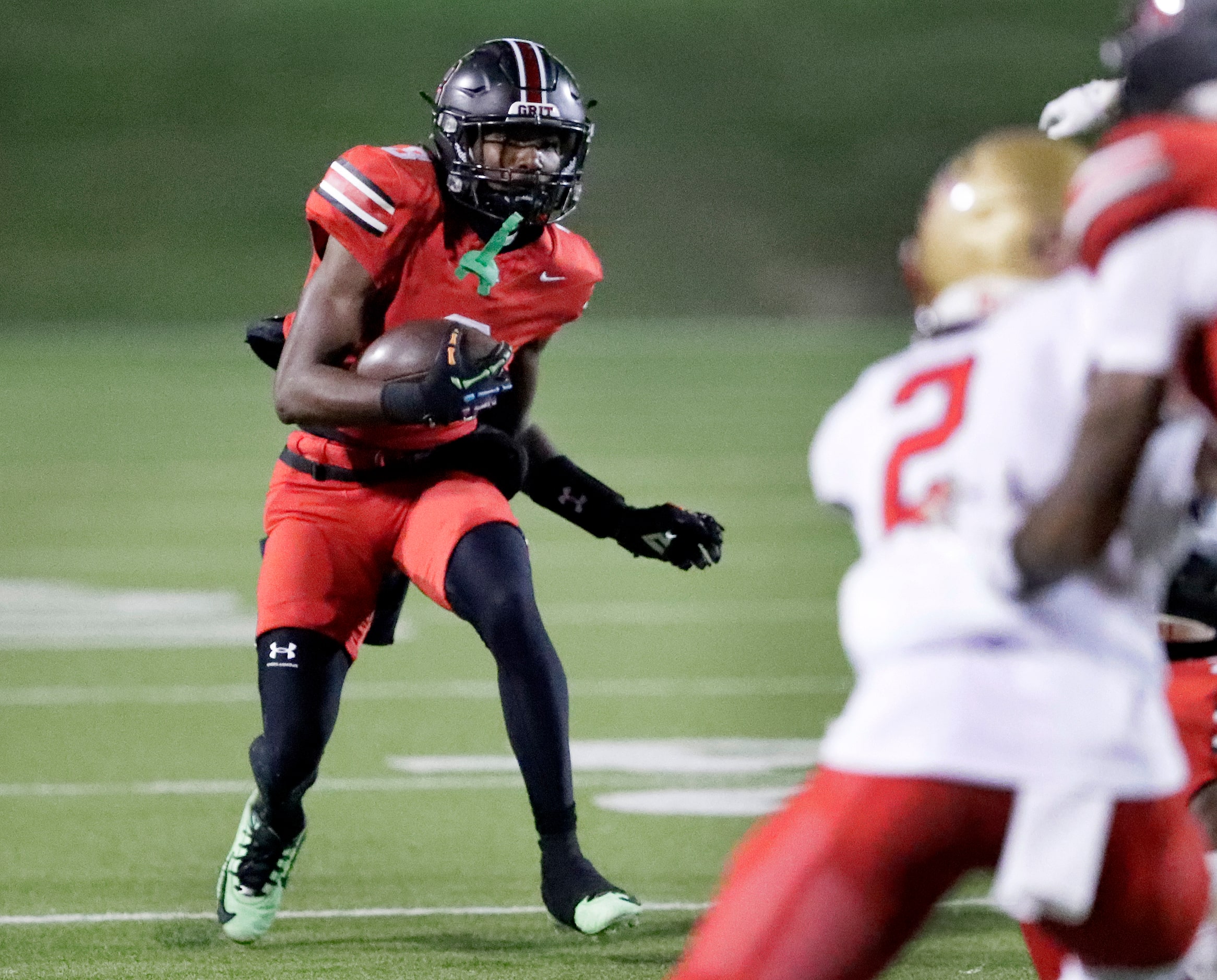 Lake Highlands High School running back Mohammed Kamara (8) runs the ball during the first...