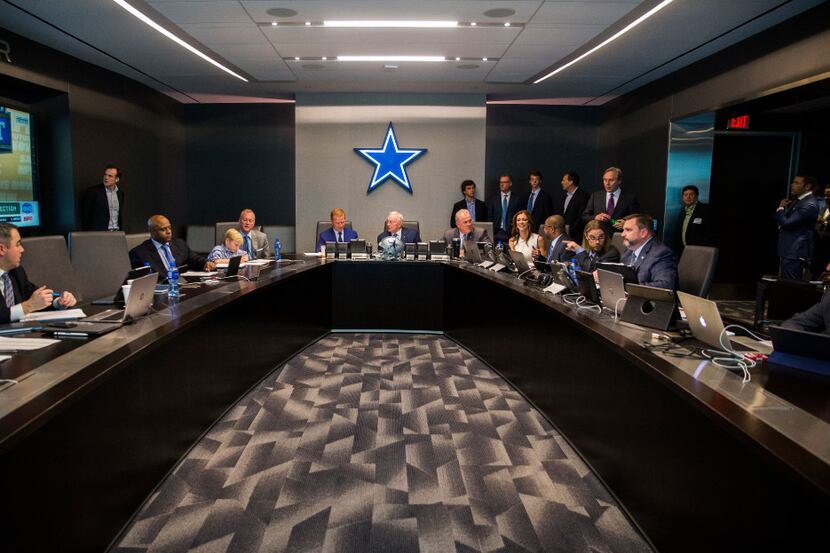 Dallas Cowboys head coach Jason Garrett, owner Jerry Jones, Executive Vice President and CEO...